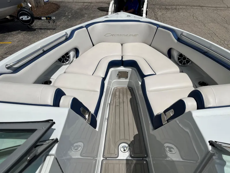 Slide: The Image of 2023 Crownline 270 SS SURF boat interior with white and blue seating. - 3