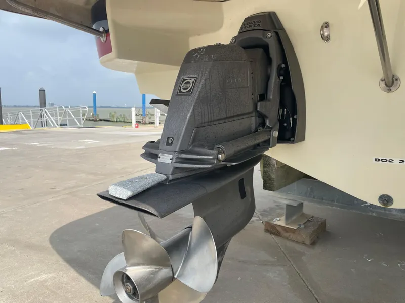 Slide: The Image of Close-up of 2013 Chris-Craft Launch 32 boat propeller and stern drive. - 37