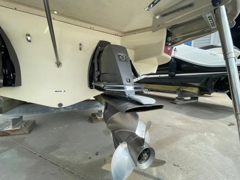 Slide: The Image of 2013 Chris-Craft Launch 32 boat stern with propeller and outdrive. - 38