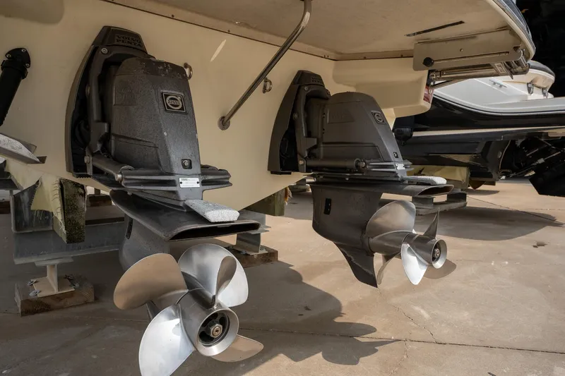 Slide: The Image of 2013 Chris-Craft Launch 32 boat propellers and stern drives in dry dock. - 4