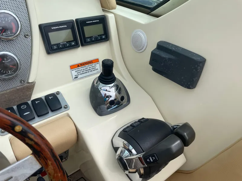 Slide: The Image of 2013 Chris-Craft Launch 32 dashboard with controls and gauges. - 47