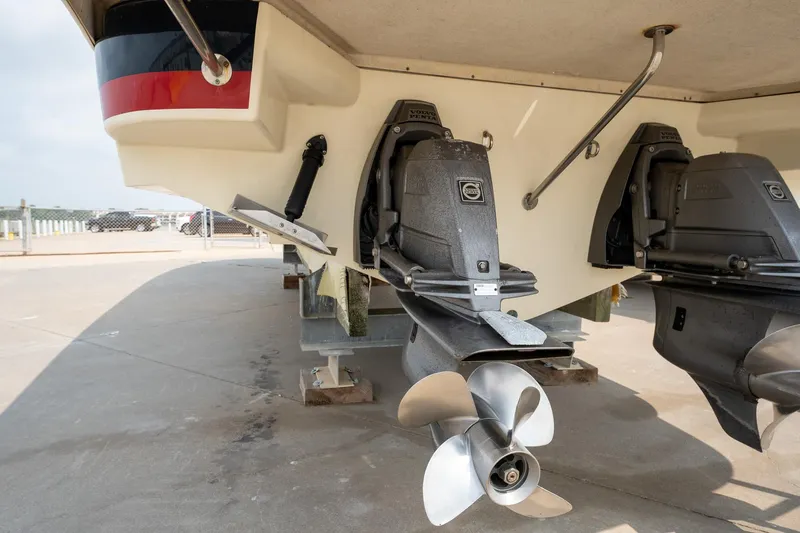 Slide: The Image of 2013 Chris-Craft Launch 32 boat propellers and stern view on a trailer. - 5