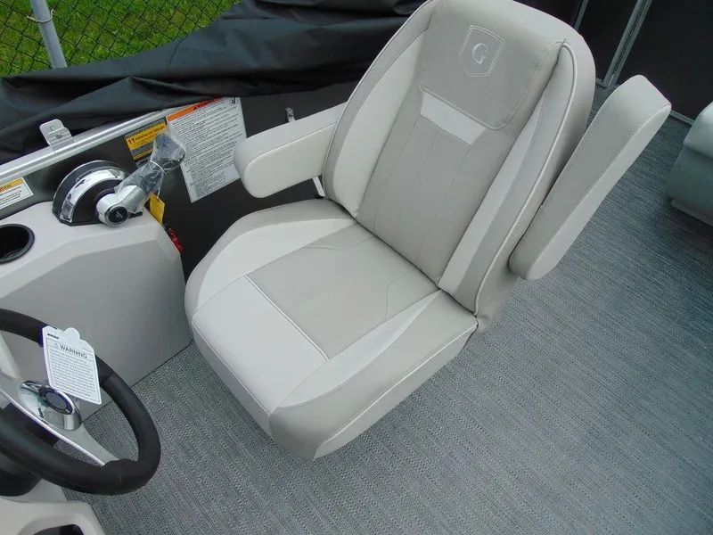 Slide: The Image of 2024 Godfrey Xperience 1880 CX captain's chair with armrests and steering wheel. - 5