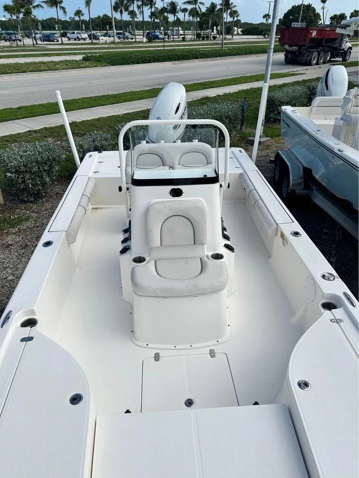Slide: The Image of 2022 Sea Born FX24 boat with center console and seating. - 3