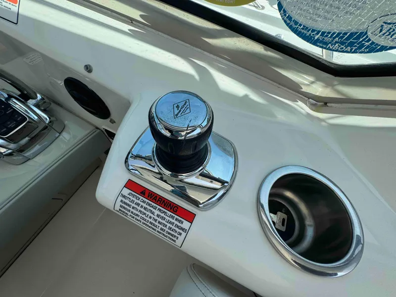 Slide: The Image of Close-up of the control panel on a 2010 Sea Ray 390 Sundancer boat. - 10
