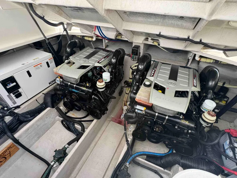 Slide: The Image of Engine room of a 2010 Sea Ray 390 Sundancer with twin engines. - 32