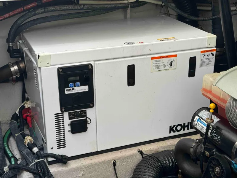 Slide: The Image of Kohler generator in the engine room of a 2010 Sea Ray 390 Sundancer boat. - 34