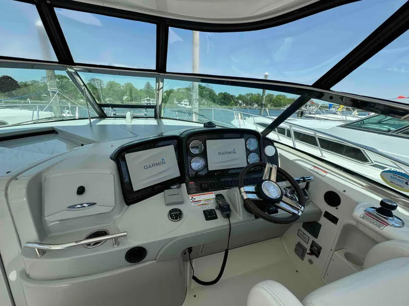 Slide: The Image of Helm of 2010 Sea Ray 390 Sundancer with Garmin navigation system. - 7