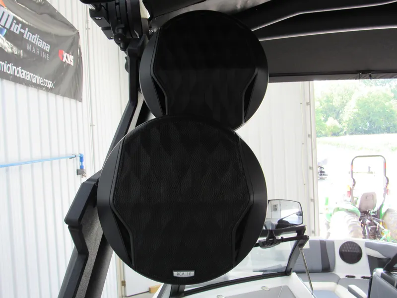 Slide: The Image of 2024 Malibu Wakesetter 23 MXZ boat speakers in a garage setting. - 18