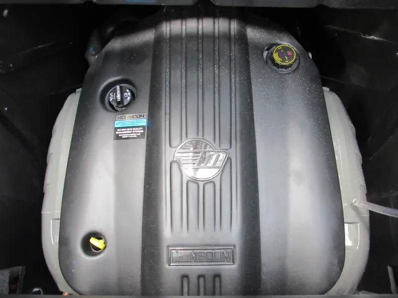 Slide: The Image of 2024 Malibu Wakesetter 23 MXZ engine close-up, showcasing modern design and branding. - 22