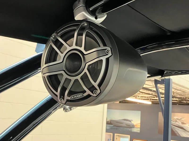 Slide: The Image of 2024 Cobalt R4 Surf boat with JL Audio speaker system. - 19