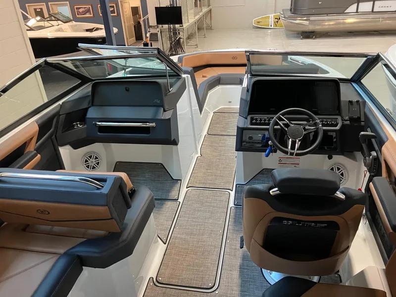 Slide: The Image of 2024 Cobalt R4 Surf boat interior with modern dashboard and seating. - 7