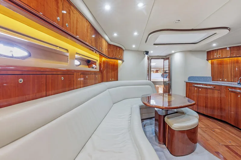 Slide: The Image of Luxurious interior of 2002 Sea Ray 550 Sundancer yacht with elegant wood finishes. - 14