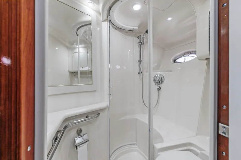 Slide: The Image of Luxurious bathroom in 2002 Sea Ray 550 Sundancer yacht with shower and vanity. - 22
