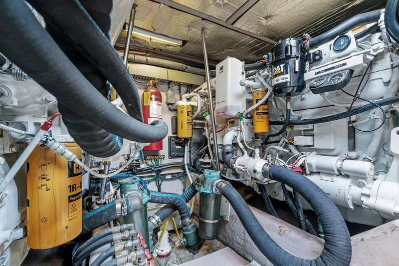 Slide: The Image of Engine room of a 2002 Sea Ray 550 Sundancer yacht with CAT machinery. - 27