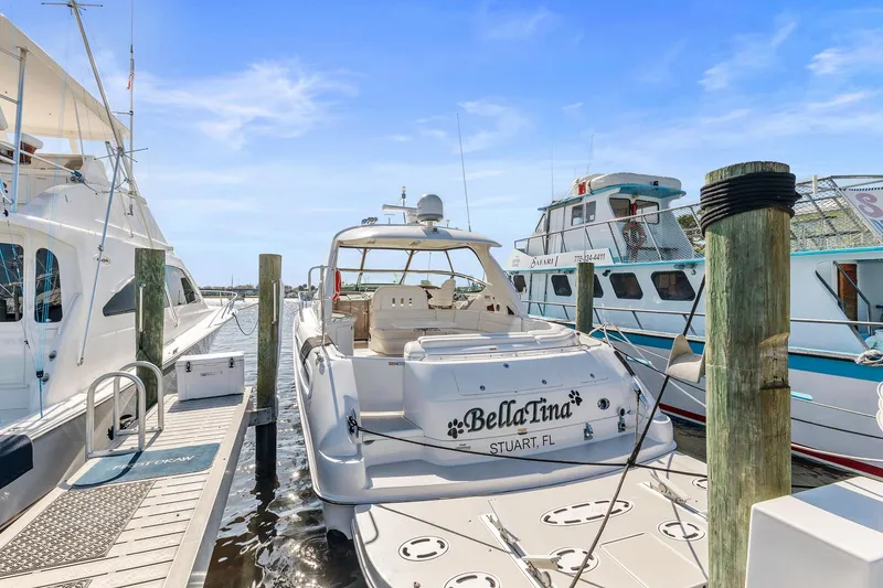 Slide: The Image of Sea Ray 550 Sundancer 2002 docked at marina, named Bella Tina, Stuart, FL. - 4