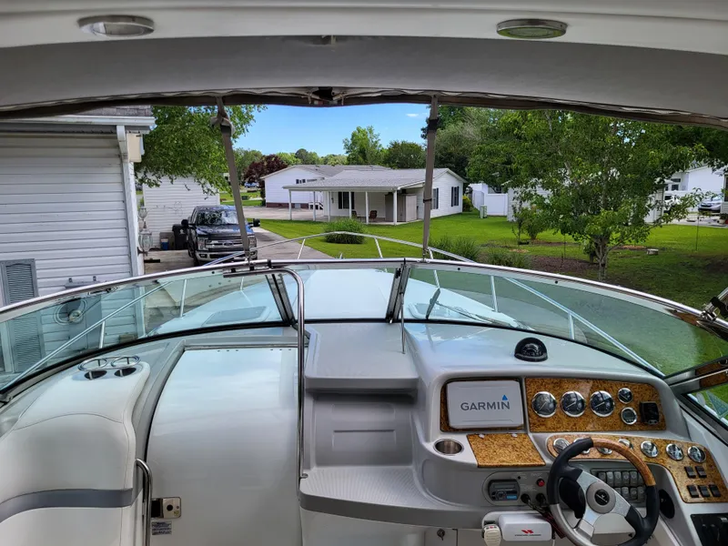 Slide: The Image of 2007 Formula 330 SS boat cockpit with Garmin navigation system. - 21