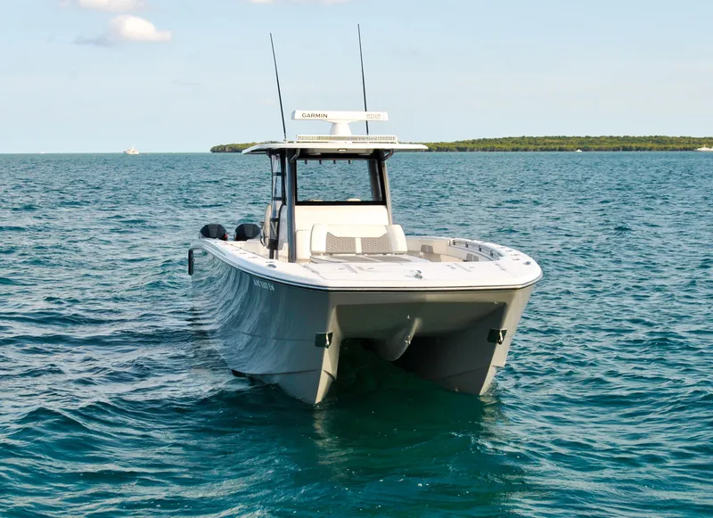 Slide: The Image of 2020 Invincible 40 Catamaran on open water. - 1