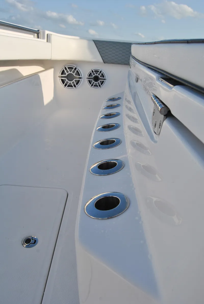 Slide: The Image of 2020 Invincible 40 Catamaran deck with rod holders and speakers. - 24