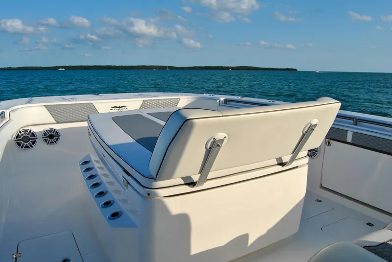 Slide: The Image of Invincible 40 Catamaran 2020 model, rear seating area with ocean view. - 25