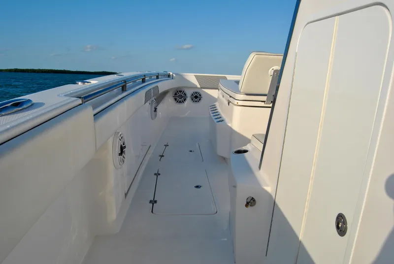 Slide: The Image of 2020 Invincible 40 Catamaran deck with seating and ocean view. - 26