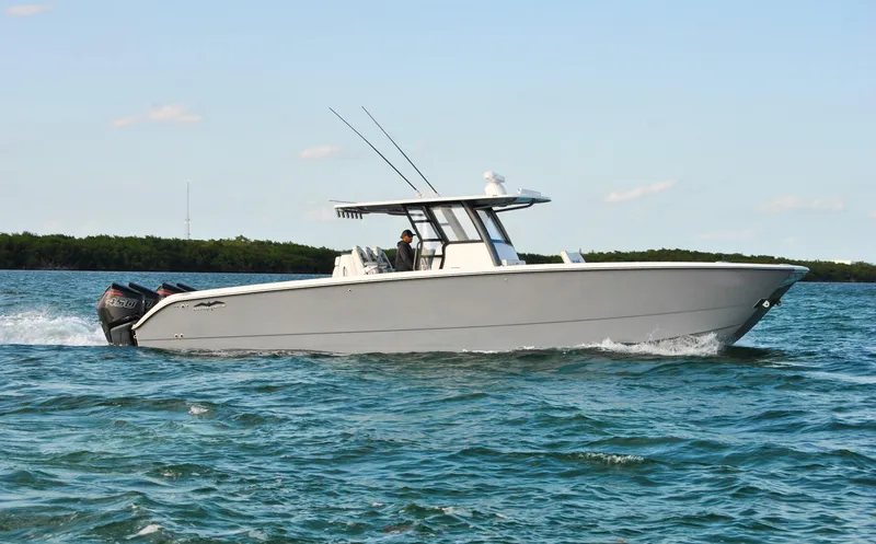 Slide: The Image of 2020 Invincible 40 Catamaran cruising on open water. - 3