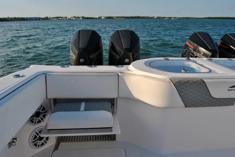 Slide: The Image of Invincible 40 Catamaran 2020 model with quad outboard engines on the water. - 37