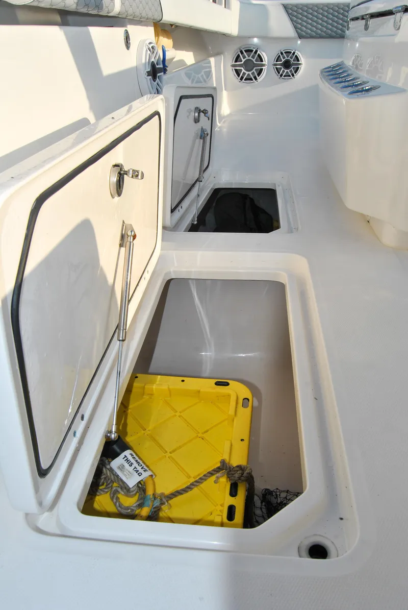 Slide: The Image of Storage compartments on a 2020 Invincible 40 Catamaran boat. - 44