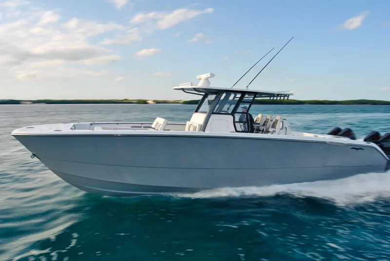 Slide: The Image of 2020 Invincible 40 Catamaran cruising on open water. - 7