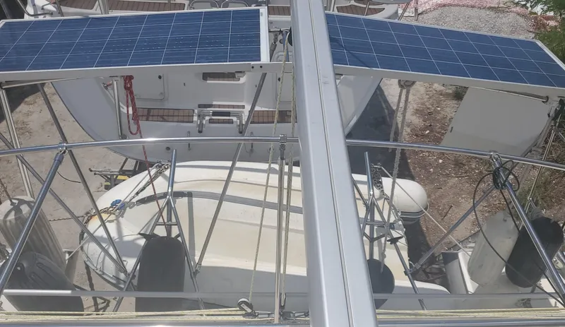 Slide: The Image of 1992 Fountaine Pajot Antigua 37 catamaran with solar panels on deck. - 10