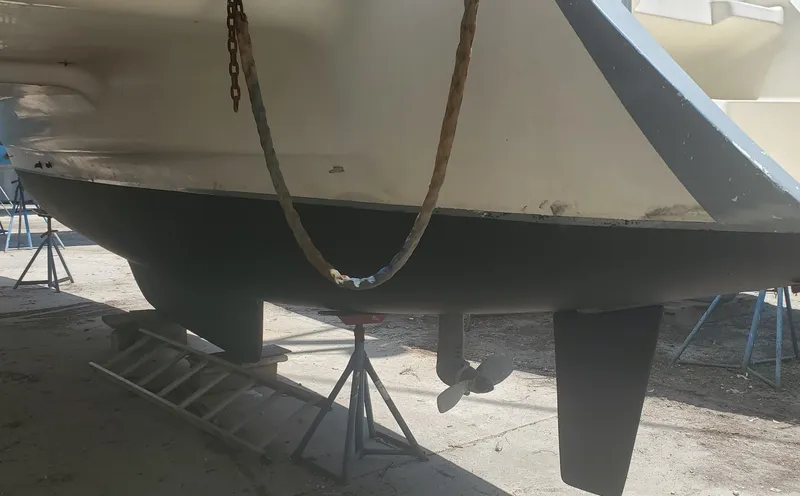 Slide: The Image of 1992 Fountaine Pajot Antigua 37 catamaran hull in dry dock. - 15