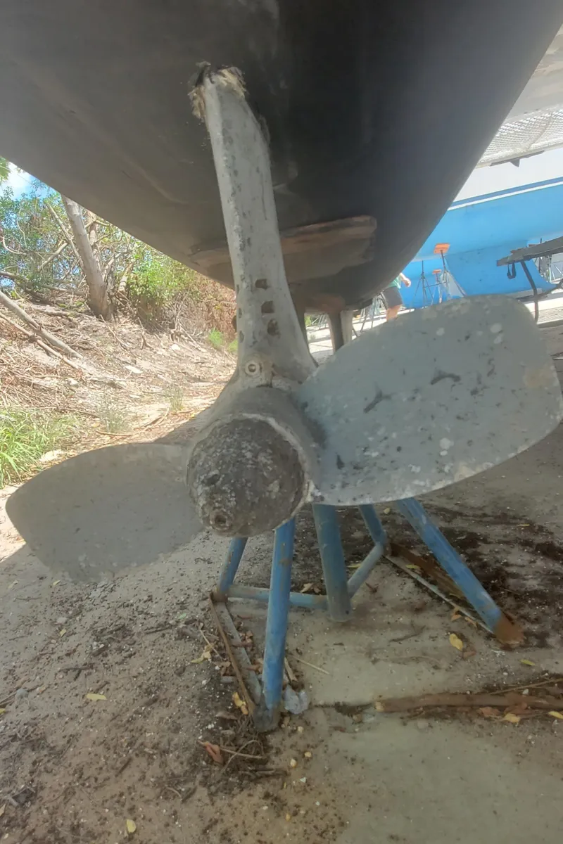 Slide: The Image of Propeller of a 1992 Fountaine Pajot Antigua 37 catamaran on dry dock. - 16
