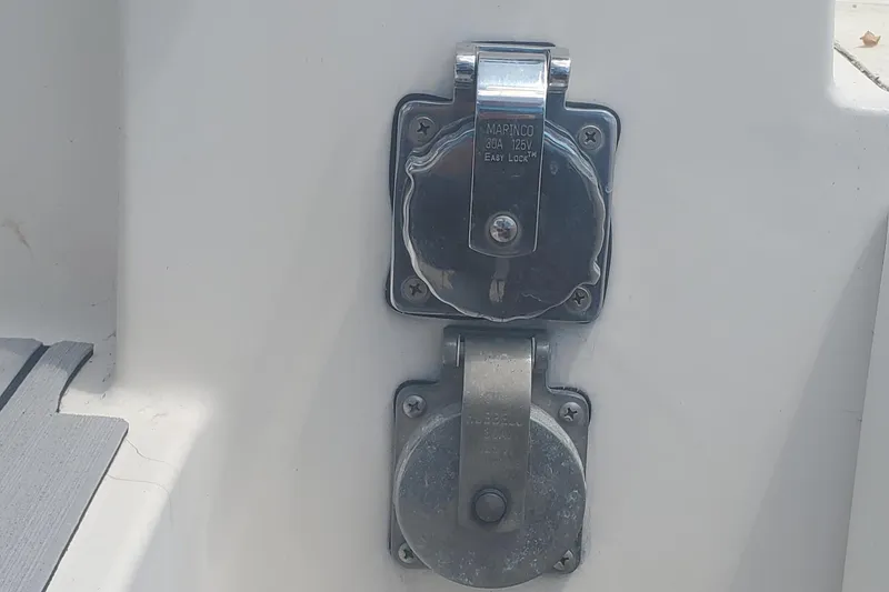 Slide: The Image of Close-up of electrical outlets on a 1992 Fountaine Pajot Antigua 37 catamaran. - 23