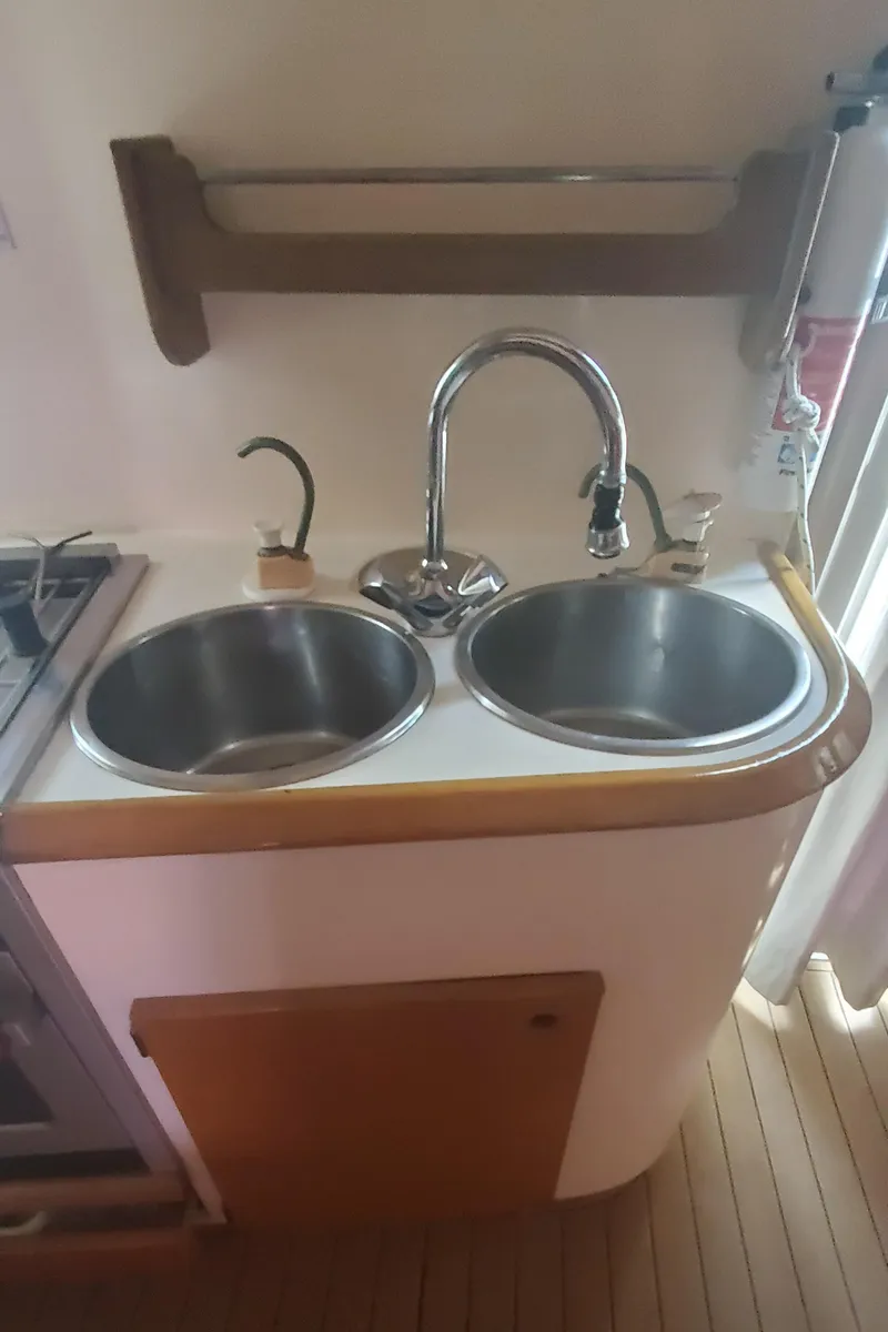 Slide: The Image of Double sink in the galley of a 1992 Fountaine Pajot Antigua 37 catamaran. - 33