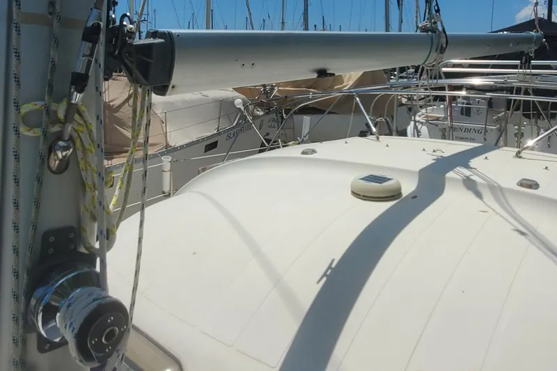 Slide: The Image of 1992 Fountaine Pajot Antigua 37 sailboat deck with rigging and winch. - 9