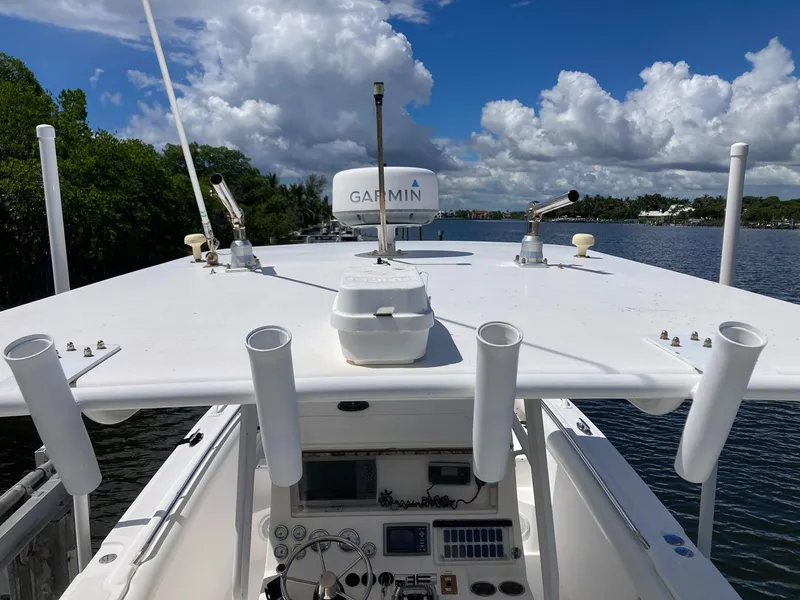 Slide: The Image of 2014 Marlago 35 boat with Garmin navigation system on a sunny day. - 27