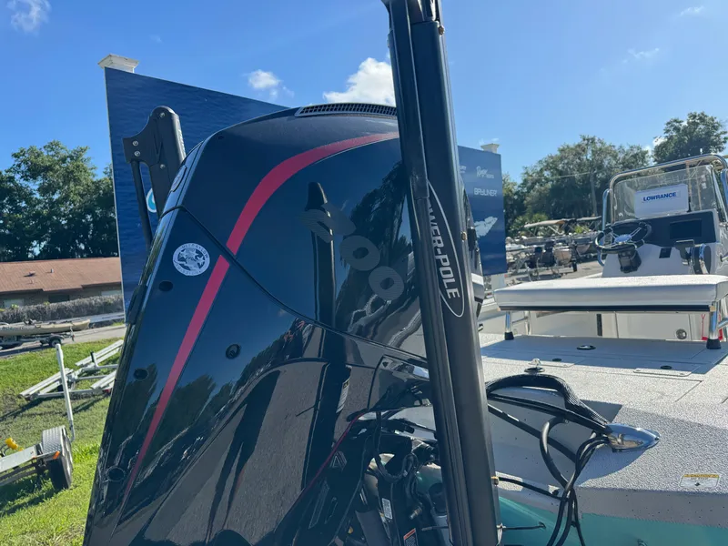 Slide: The Image of 2024 Ranger RB210 boat with outboard motor and Power-Pole anchor system. - 10