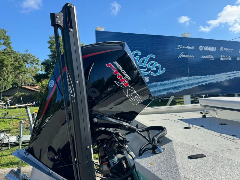 Slide: The Image of 2024 Ranger RB210 boat with Mercury Pro XS engine. - 11