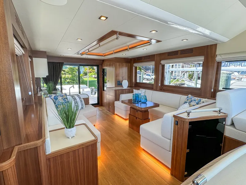 Slide: The Image of Luxurious interior of the 2024 Sirena 58 Flybridge yacht with modern furnishings. - 47