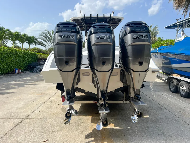 Slide: The Image of 2014 Midnight Express 37 Open with triple 300 horsepower engines. - 13