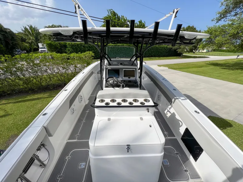 Slide: The Image of 2014 Midnight Express 37 Open boat interior with console and seating. - 20