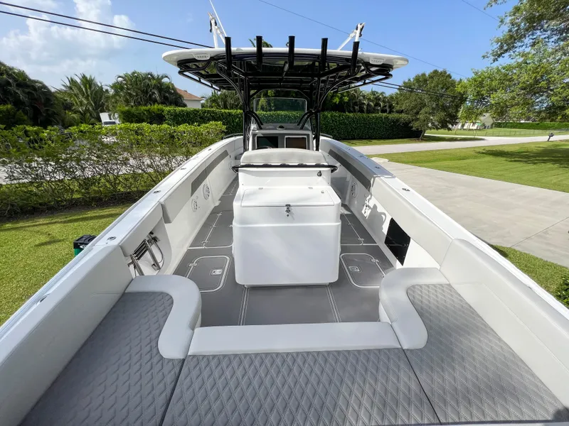 Slide: The Image of 2014 Midnight Express 37 Open boat interior with seating and console. - 21