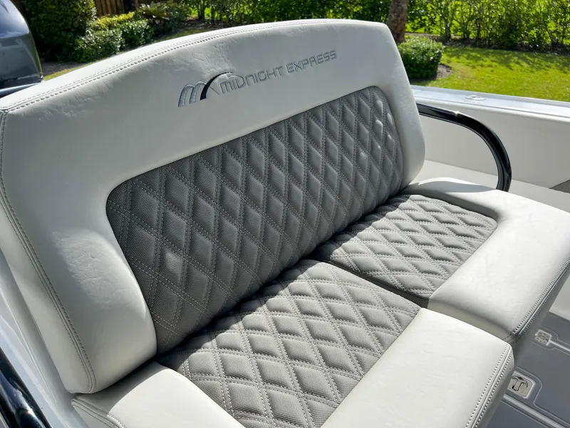 Slide: The Image of 2014 Midnight Express 37 Open boat seat with diamond-stitched upholstery. - 28