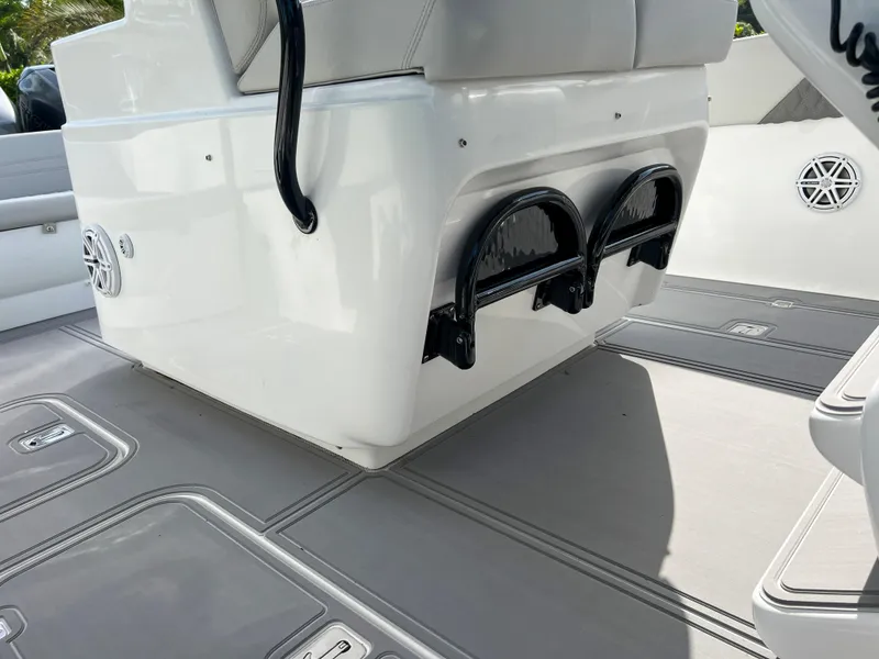 Slide: The Image of 2014 Midnight Express 37 Open boat interior with seating and storage compartments. - 34