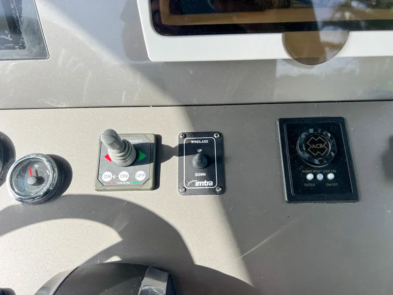 Slide: The Image of Control panel of a 2014 Midnight Express 37 Open boat. - 40