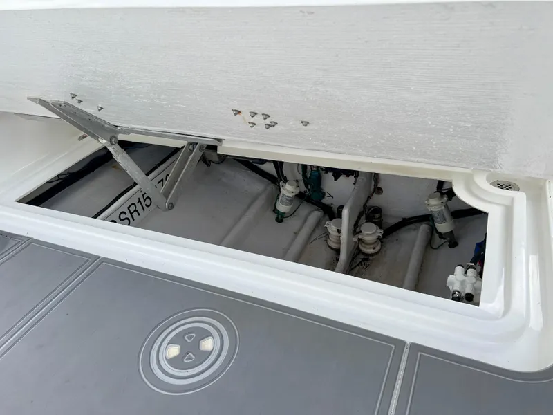Slide: The Image of 2014 Midnight Express 37 Open boat storage compartment with hydraulic lift. - 44