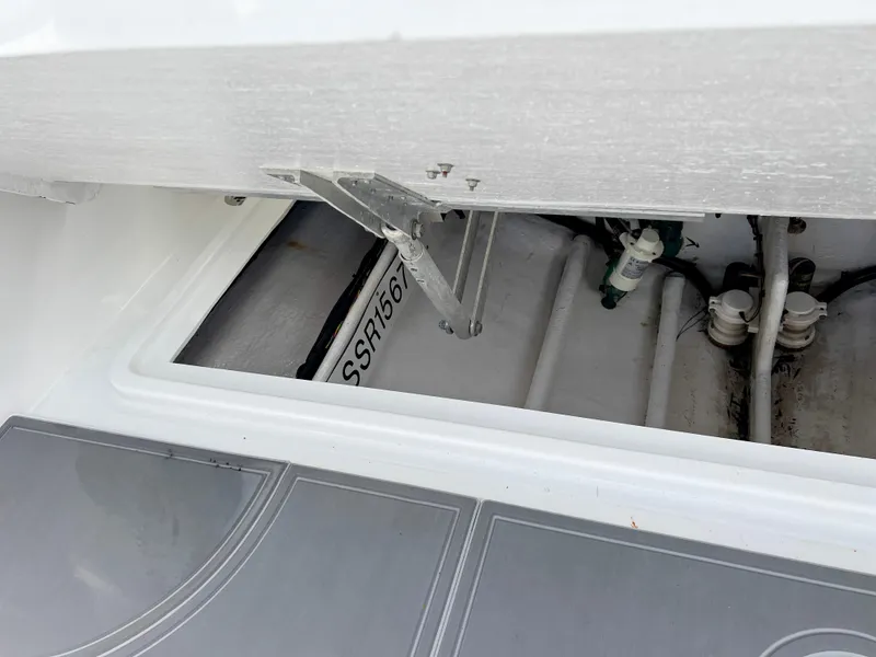 Slide: The Image of Open storage compartment of a 2014 Midnight Express 37 Open boat. - 45