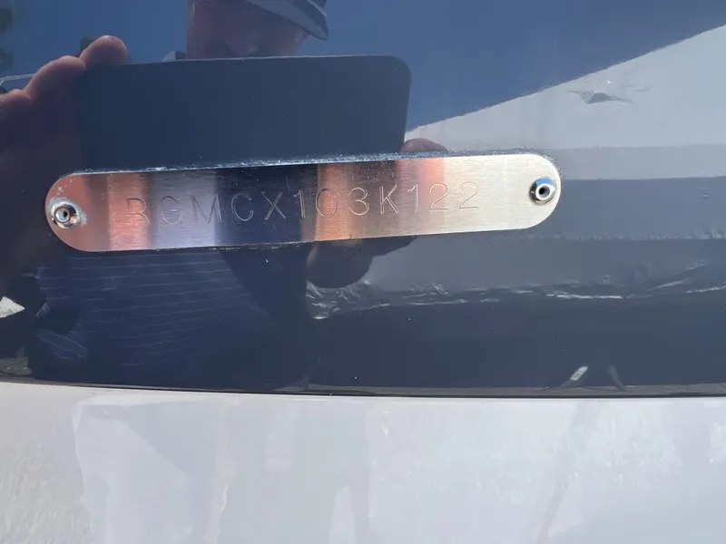 Slide: The Image of 2022 Regal LX2 boat identification plate with serial number RGMGX103K122. - 23