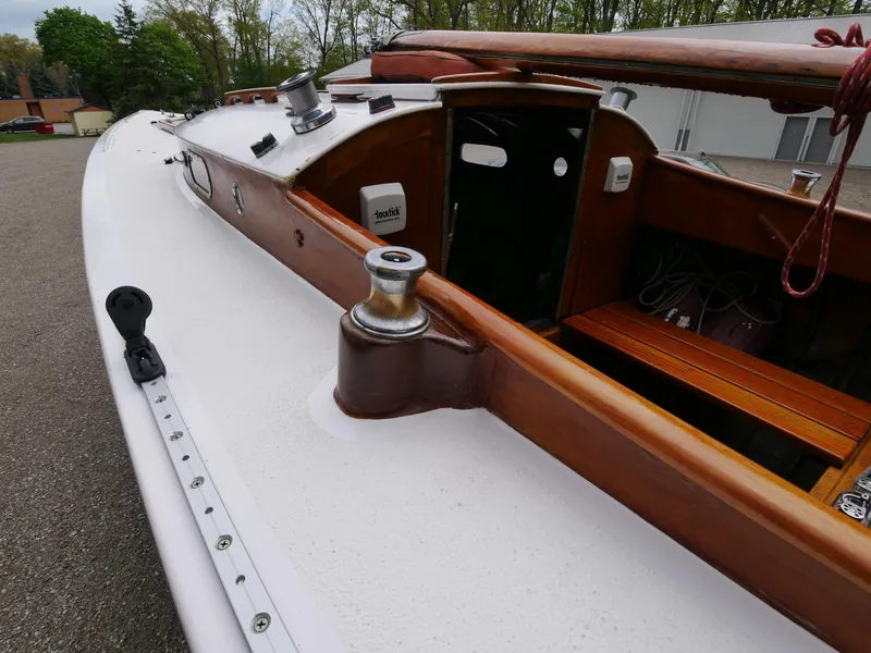 Slide: The Image of 1935 Custom 44' 30-Square Meter Sailing Yacht deck with wooden details and winch. - 19