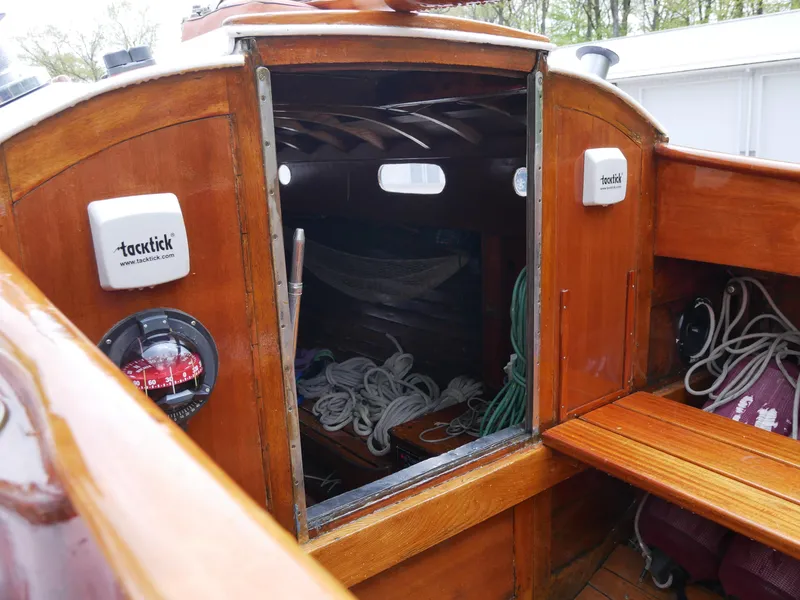 Slide: The Image of Interior view of 1935 Custom 44' 30-Square Meter Sailing Yacht with wooden finish and ropes. - 20